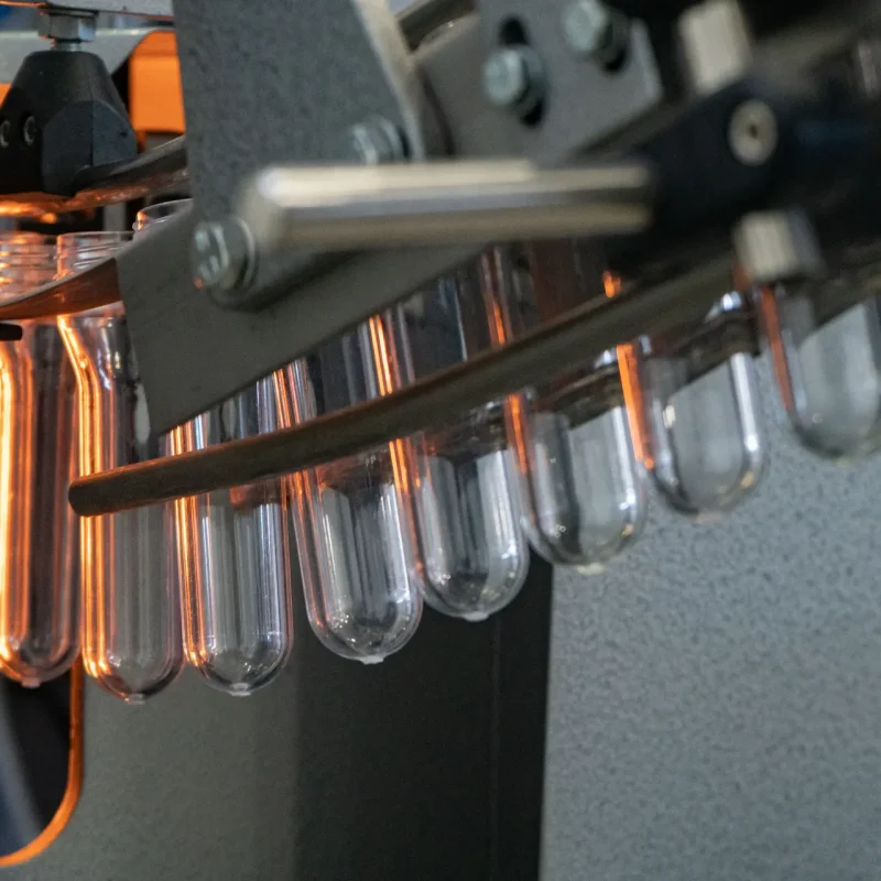 various-type-plastic-bottle-product-preform-material-with-injection-mold-background-drinking-container-manufacturing-processing